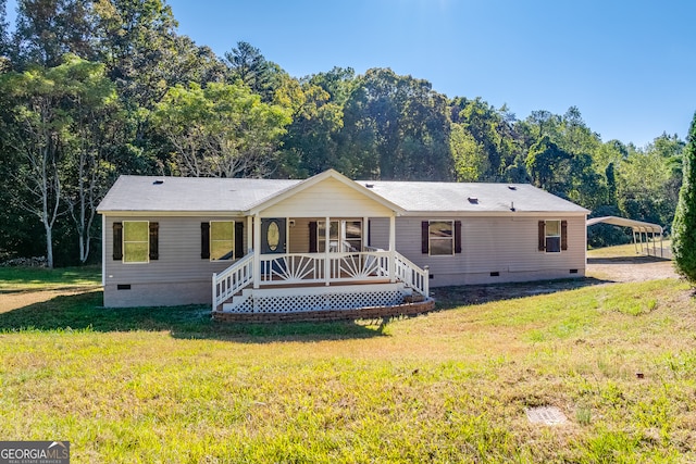 back of house with a yard