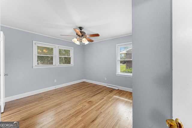 unfurnished room featuring crown molding, light hardwood / wood-style flooring, a baseboard heating unit, and ceiling fan