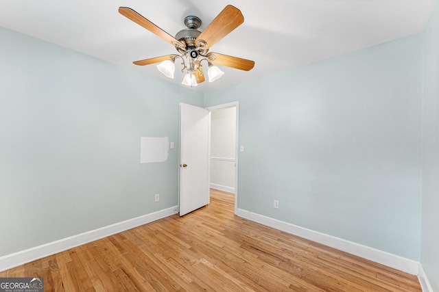 unfurnished bedroom featuring light wood-type flooring and ceiling fan