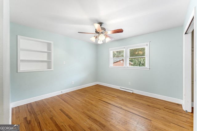 unfurnished bedroom featuring wood-type flooring and ceiling fan