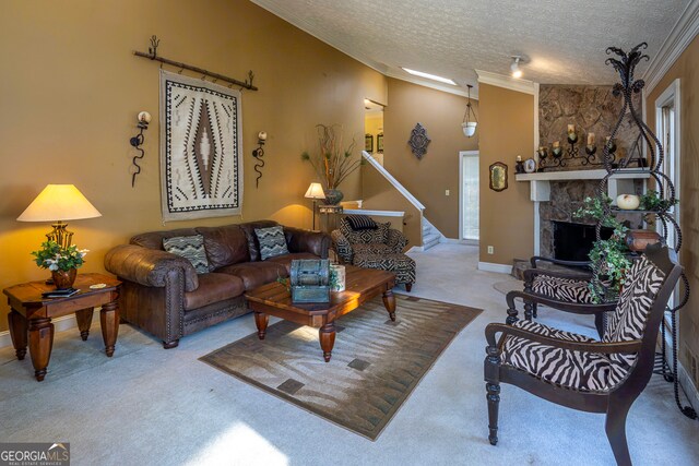 living room with carpet, a textured ceiling, crown molding, a stone fireplace, and lofted ceiling