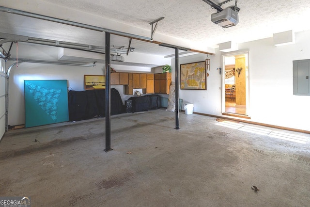 garage featuring electric panel and a garage door opener