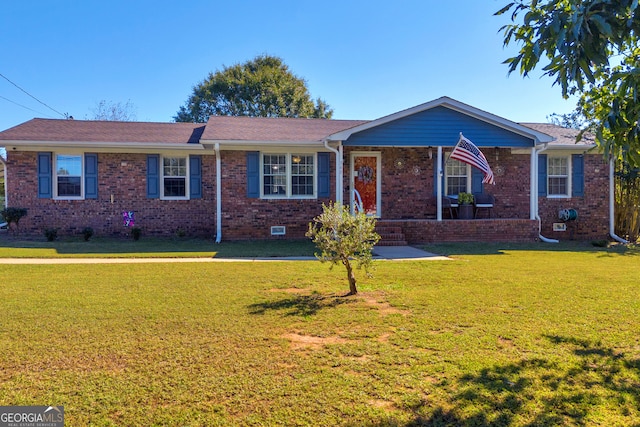 ranch-style house featuring a front lawn