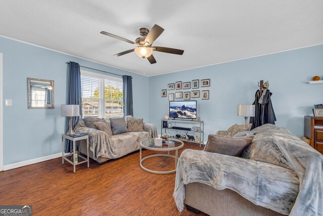 dining space with ceiling fan, wood-type flooring, and sink