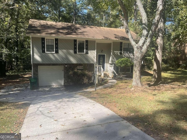 raised ranch featuring a garage