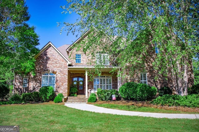 view of front facade with a front lawn