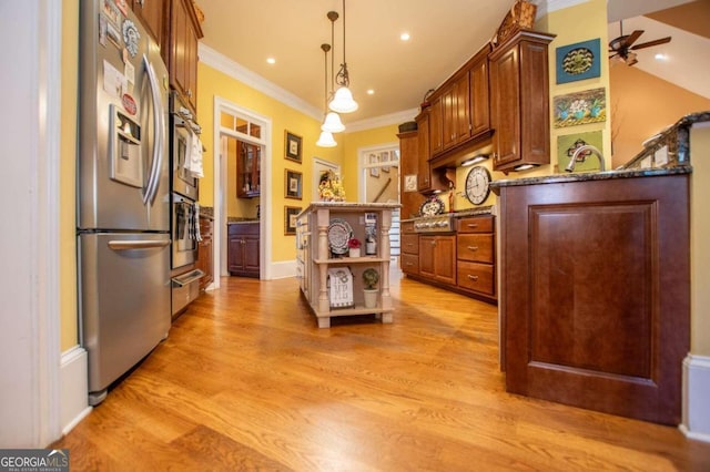 kitchen with stainless steel fridge, hanging light fixtures, ceiling fan, light wood-type flooring, and crown molding