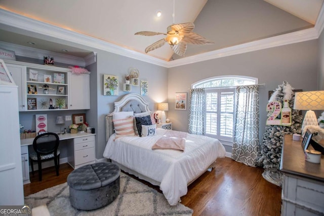 bedroom with dark hardwood / wood-style flooring, crown molding, built in desk, and ceiling fan