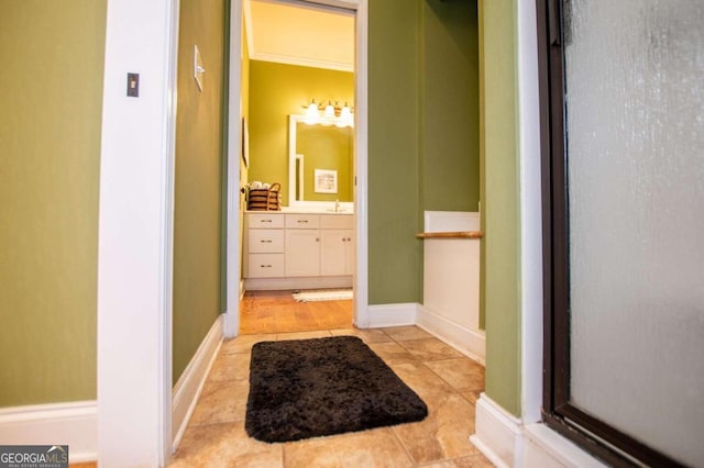 bathroom with vanity and tile patterned flooring