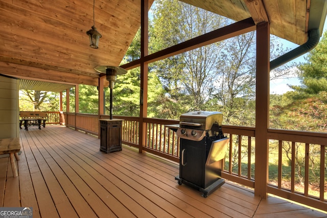 deck featuring a grill