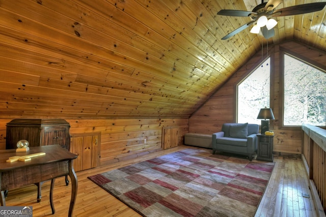 full bath featuring wood walls and a bath