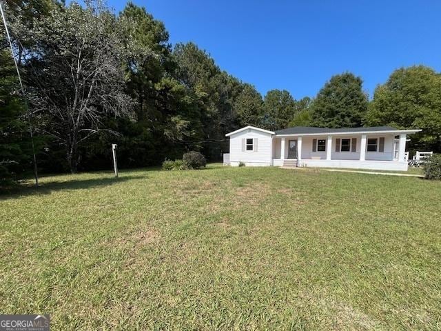 exterior space featuring a front lawn