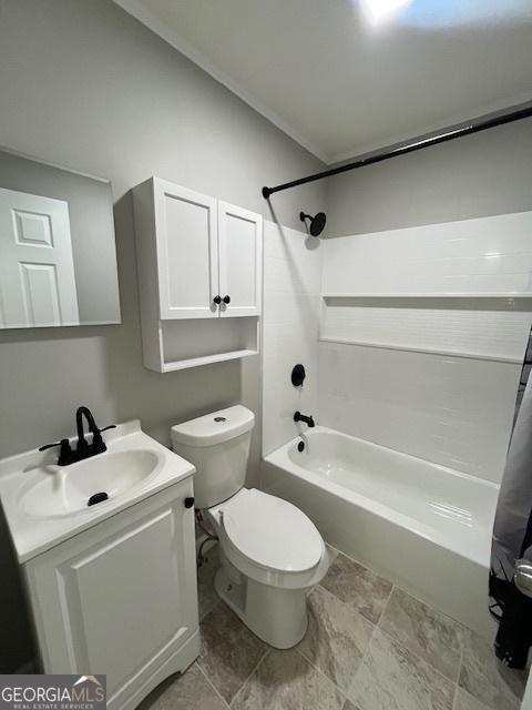 full bathroom featuring toilet, vanity, and shower / bath combination