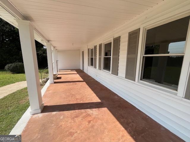 view of patio featuring covered porch