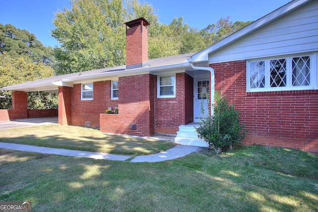 view of front of home featuring a front lawn