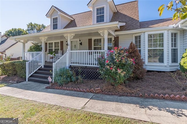 cape cod home with covered porch