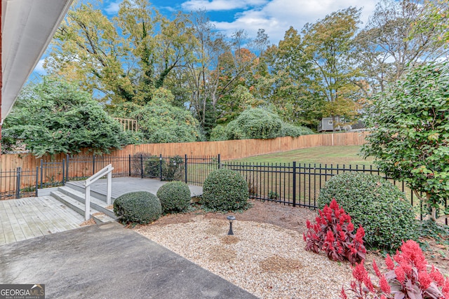 view of yard featuring a deck