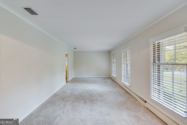 carpeted spare room with a baseboard radiator and crown molding