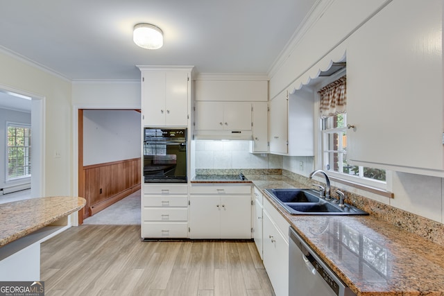 kitchen featuring white cabinetry, a wealth of natural light, stainless steel appliances, and sink