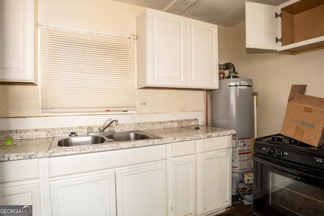 kitchen with a textured ceiling, white cabinets, sink, and gas water heater