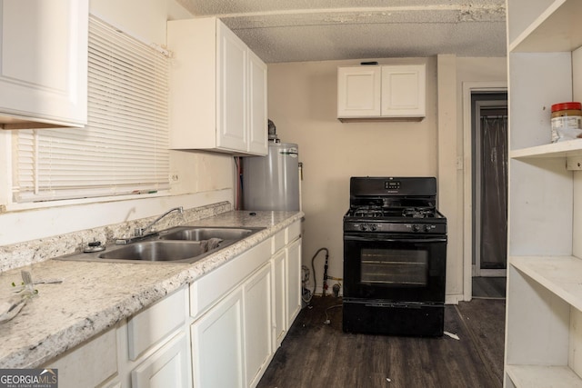 kitchen with gas stove, white cabinets, water heater, dark wood-type flooring, and sink