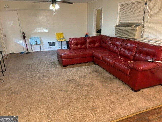 carpeted living room with cooling unit and ceiling fan