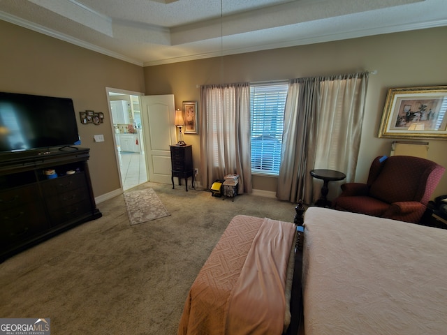 carpeted bedroom featuring crown molding and a textured ceiling