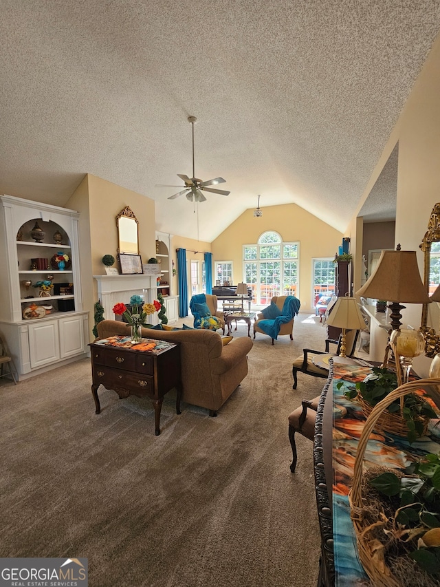 living room with carpet, vaulted ceiling, a textured ceiling, and ceiling fan