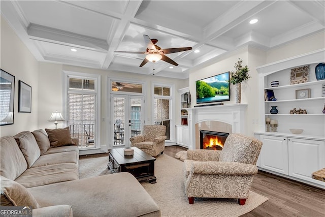 3637 Habersham Rd NW Unit 46, Atlanta, GA 30305 - living room with a glass covered fireplace, wood finished floors, french doors, ceiling fan, and recessed lighting