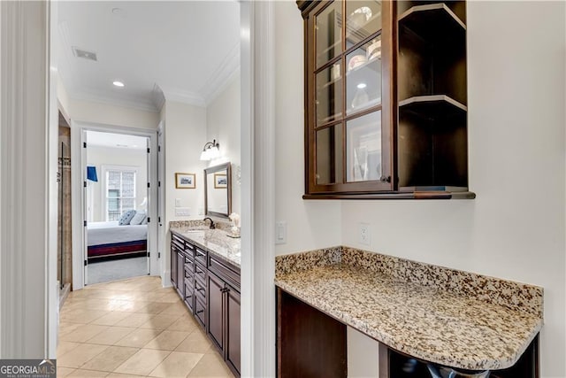 3637 Habersham Rd NW Unit 46, Atlanta, GA 30305 - bathroom with crown molding, double vanity, connected bathroom, and tile patterned floors