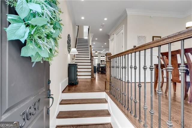 3637 Habersham Rd NW Unit 46, Atlanta, GA 30305 - stairway featuring wood finished floors, ornamental molding, and recessed lighting