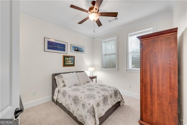 3637 Habersham Rd NW Unit 46, Atlanta, GA 30305 - bedroom featuring crown molding, carpet, and a ceiling fan
