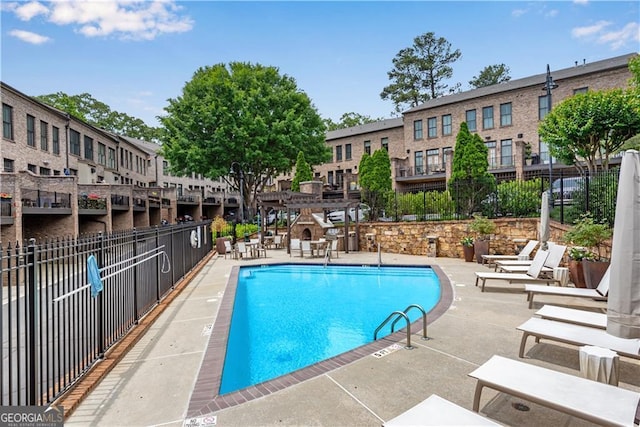 view of pool featuring a patio area