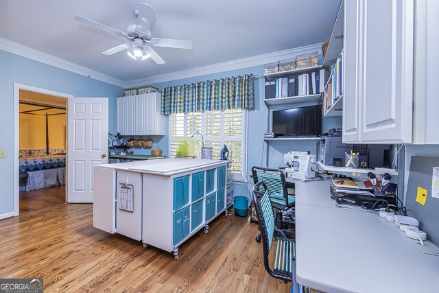 kitchen featuring white cabinetry, ornamental molding, ceiling fan, blue cabinetry, and dark hardwood / wood-style flooring