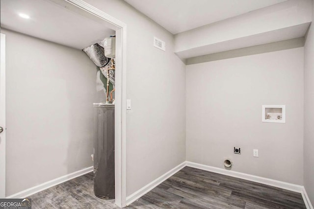 laundry area with hookup for a washing machine, electric dryer hookup, and dark wood-type flooring