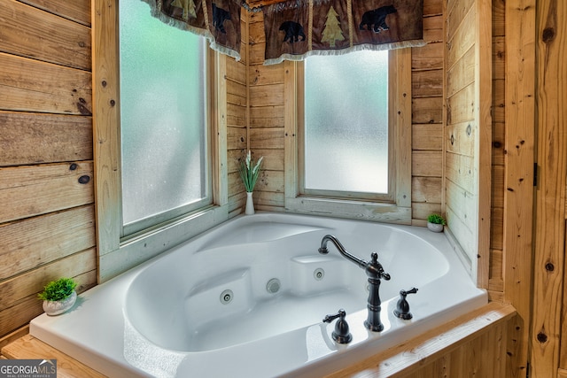 bathroom with a tub