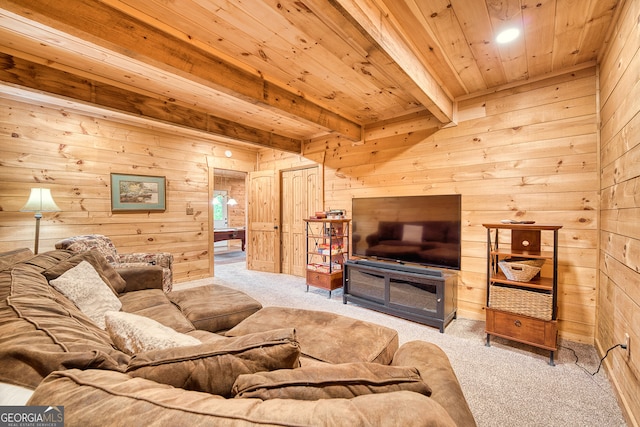 living room with wood ceiling, wood walls, beamed ceiling, and light colored carpet