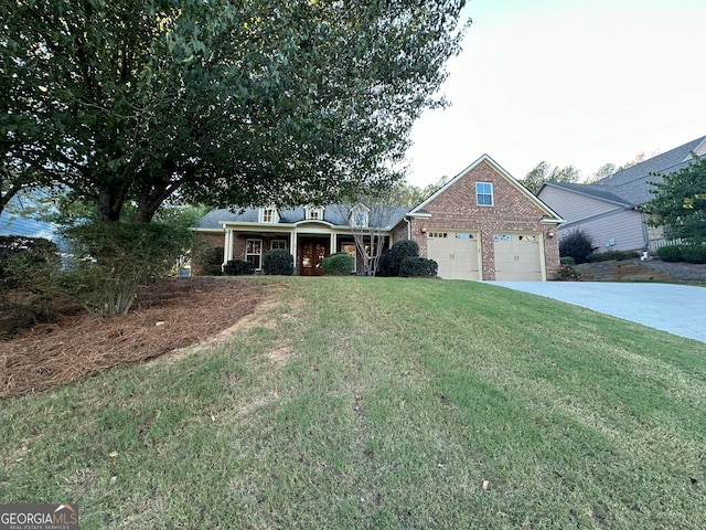 view of front of property featuring a front lawn and a garage