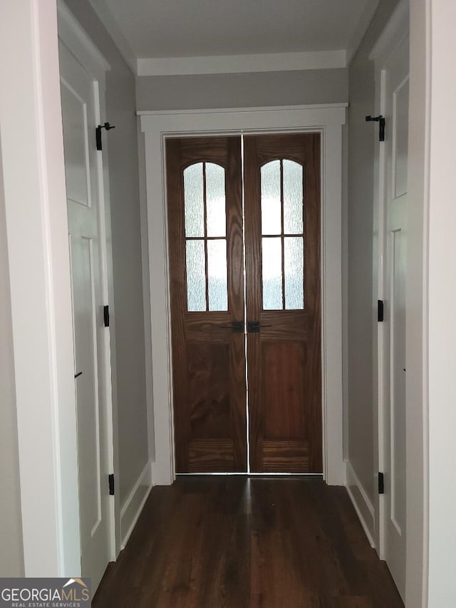 doorway featuring dark hardwood / wood-style floors