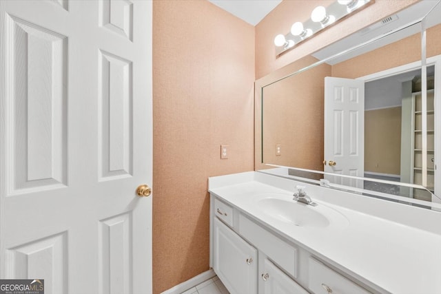 bathroom featuring vanity and tile patterned floors