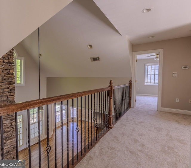 1201 Keencheefoonee Rd, Rutledge, GA 30663 - hall with carpet, vaulted ceiling, visible vents, and baseboards