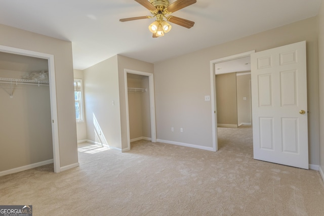 1201 Keencheefoonee Rd, Rutledge, GA 30663 - unfurnished bedroom with ceiling fan, baseboards, multiple closets, and carpet