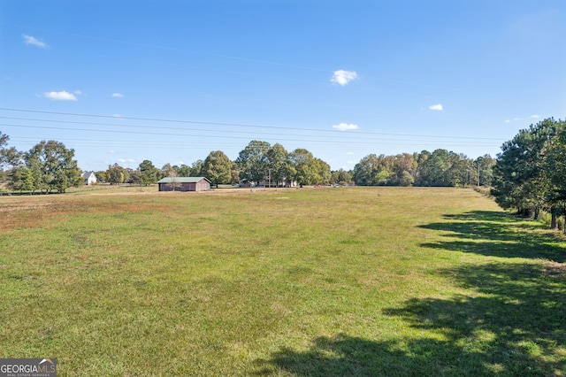 view of yard featuring a rural view