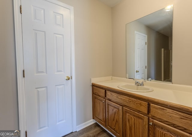 1201 Keencheefoonee Rd, Rutledge, GA 30663 - bathroom with baseboards, wood finished floors, and vanity