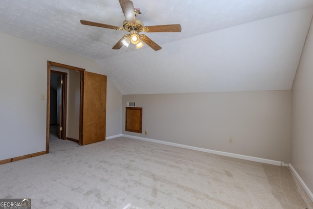1201 Keencheefoonee Rd, Rutledge, GA 30663 - additional living space with vaulted ceiling, a ceiling fan, carpet, baseboards, and visible vents