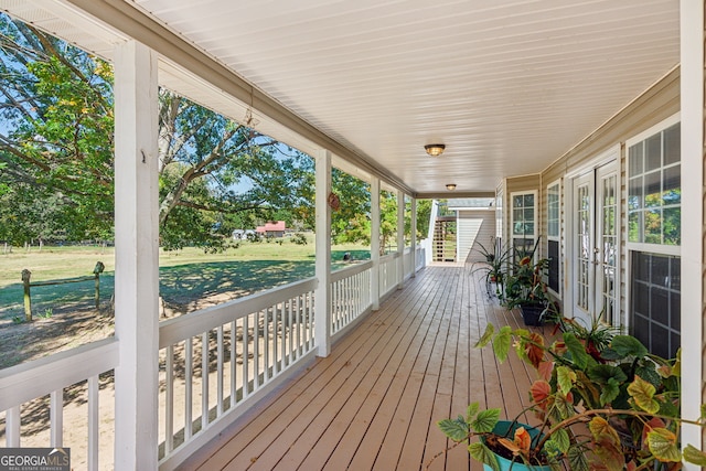 1201 Keencheefoonee Rd, Rutledge, GA 30663 - wooden deck with covered porch