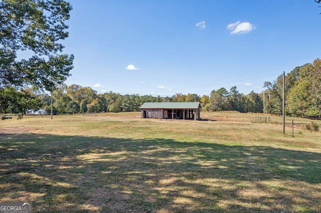 1201 Keencheefoonee Rd, Rutledge, GA 30663 - view of yard featuring a rural view, a pole building, and an outbuilding