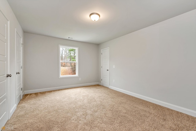 empty room with carpet floors