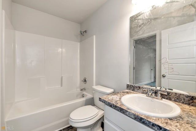 full bathroom with toilet, vanity, and bathing tub / shower combination