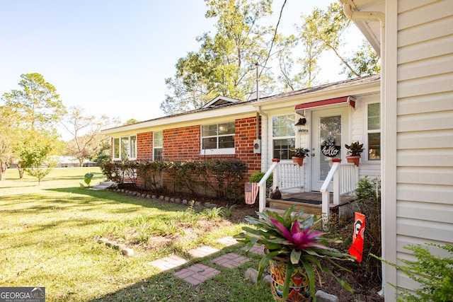 5605 Ga Highway 121, Blackshear, GA 31516 - view of side of home with a yard and brick siding